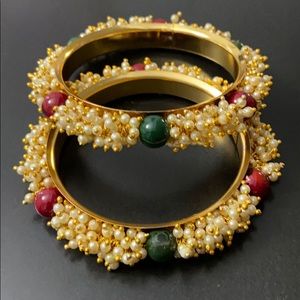 Fancy detailed bangles.